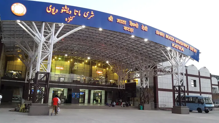 Entrance canopy of Shri Mata Vaishno Devi Katra railway station with signage in several languages
